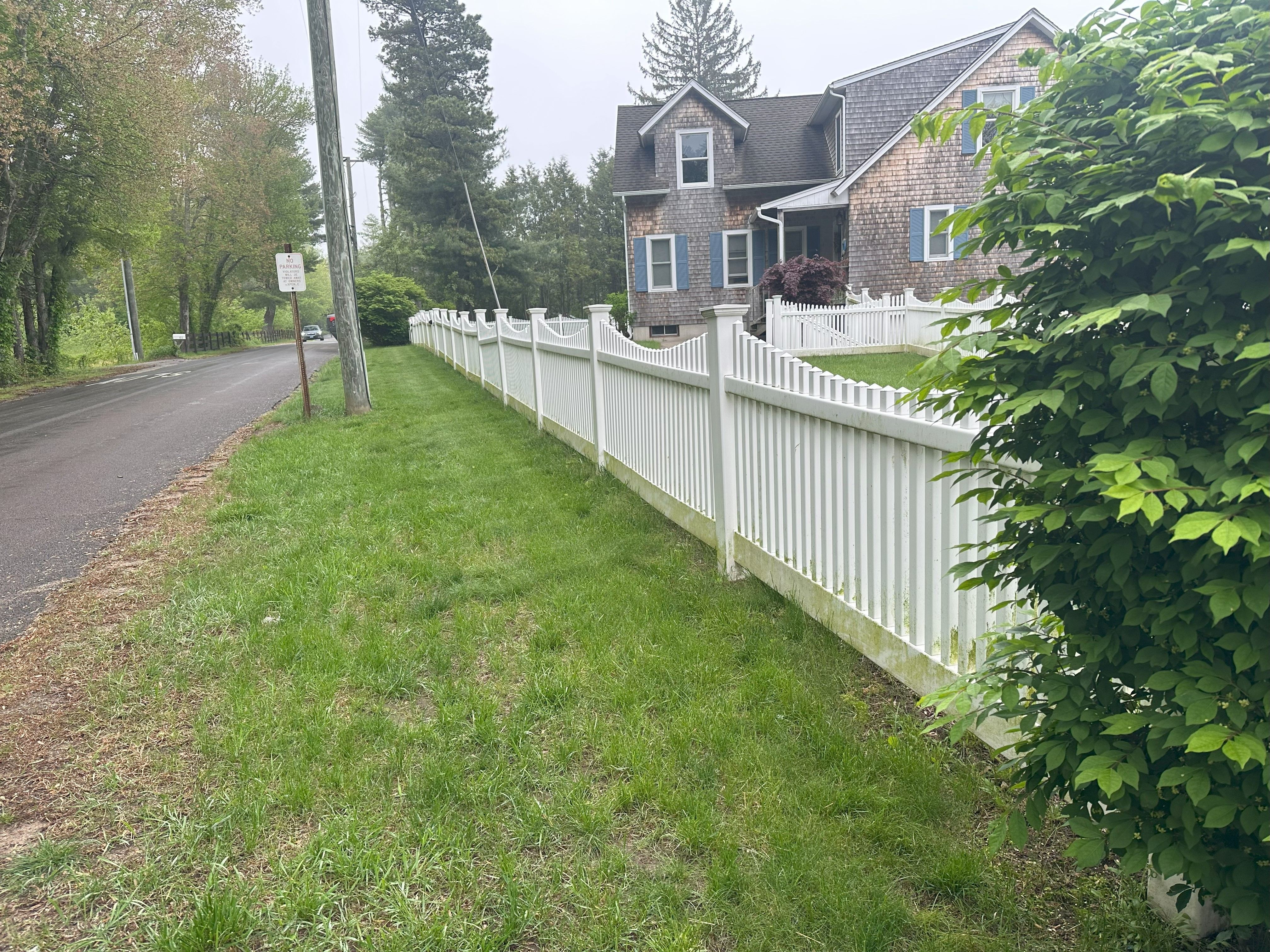 Fence before pressure washing Voluntown CT - dirty and stained with algae